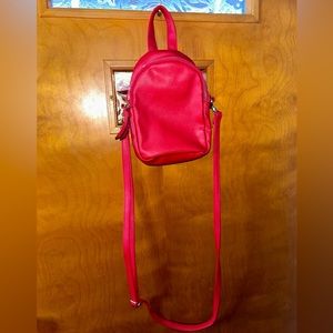 NWOT little red crossbody or can be a backpack as the straps are removable